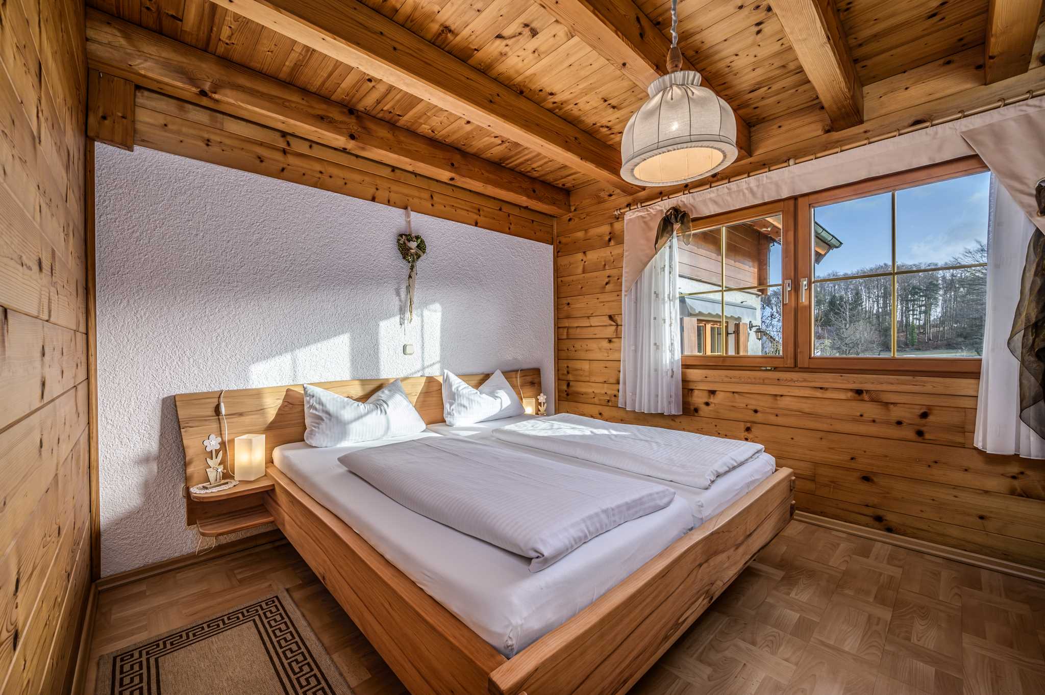 Schlafzimmer in Ferienwohnung Stefanie im Blockhäuser am Wald in der Fränkischen Schweiz